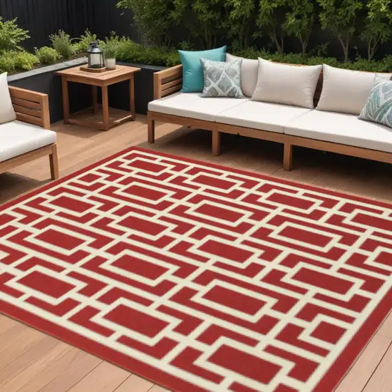Red and Ivory Geometric Stain Resistant Indoor Outdoor Area Rug Photo 1