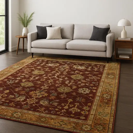 Red and Gold Oriental Power Loom Area Rug Photo 1