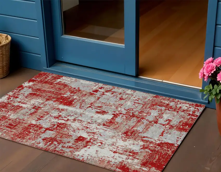 Red Gray And Ivory Abstract Washable Indoor Outdoor Area Rug Photo 1