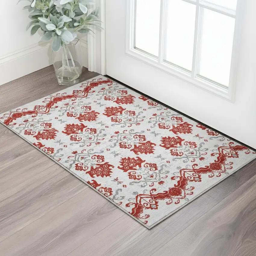 Red Gray And Ivory Medallion Washable Area Rug With UV Protection Photo 2
