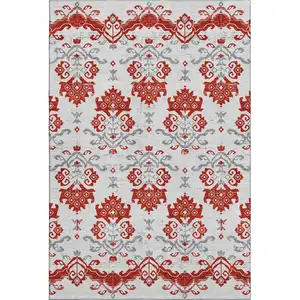 Photo of Red Gray And Ivory Medallion Washable Area Rug With UV Protection