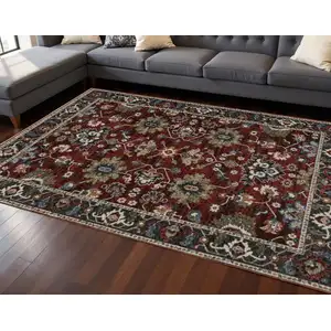 Photo of Red Ivory And Blue Oriental Area Rug With Fringe