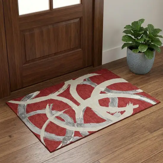 Red Ivory And Gray Abstract Washable Area Rug With UV Protection Photo 1