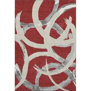 Photo of Red Ivory And Gray Abstract Washable Area Rug With UV Protection