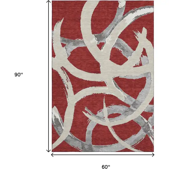 Red Ivory And Gray Abstract Washable Area Rug With UV Protection Photo 9