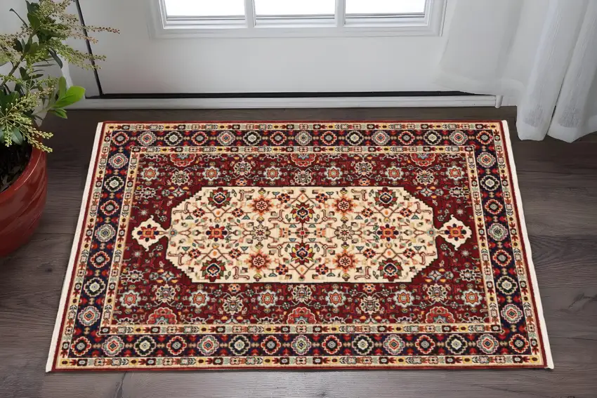 Red Ivory Blue And Orange Oriental Power Loom Stain Resistant Area Rug With Fringe Photo 1