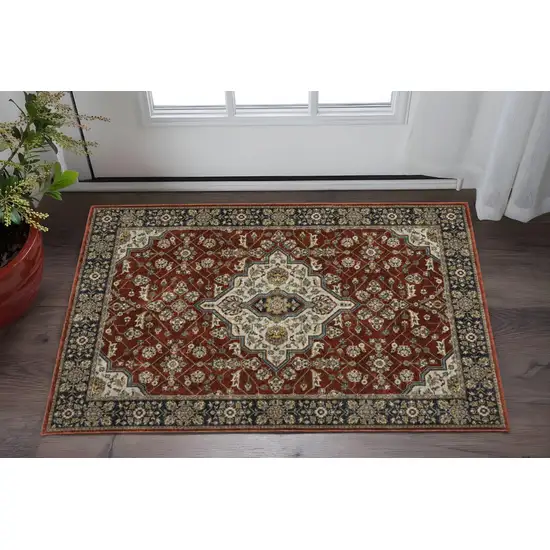 Red Ivory Blue Navy Gold And Grey Oriental Power Loom Stain Resistant Area Rug With Fringe Photo 1