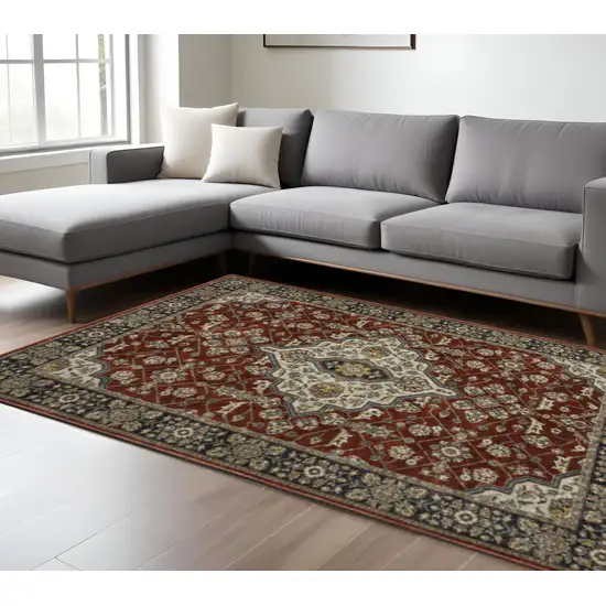 Red Ivory Blue Navy Gold And Grey Oriental Power Loom Stain Resistant Area Rug With Fringe Photo 1