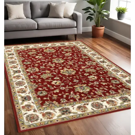 Red And Ivory Oriental Area Rug Photo 1