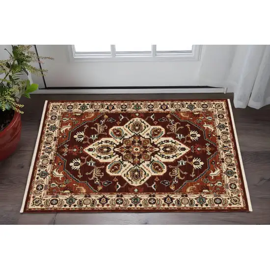 Red Ivory Orange And Blue Oriental Power Loom Stain Resistant Area Rug With Fringe Photo 1
