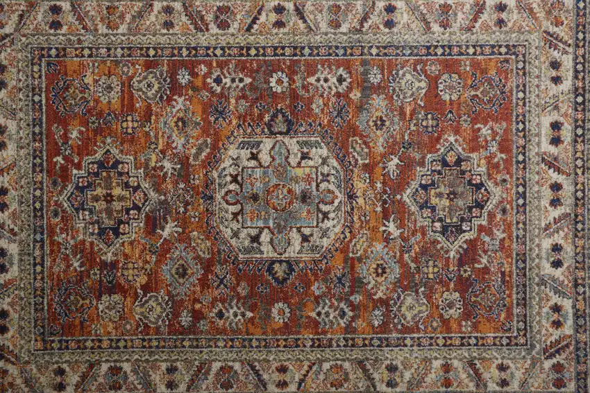 Red Orange And Ivory Floral Stain Resistant Area Rug Photo 6
