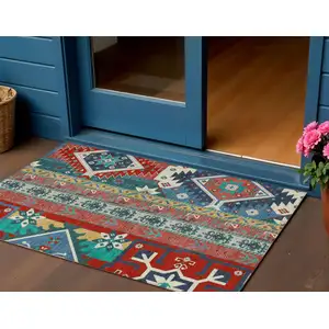 Photo of Red Pink And Teal Blue Aztec Washable Indoor Outdoor Area Rug