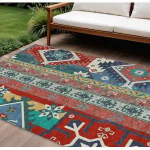 Photo of Red Pink And Teal Blue Aztec Washable Indoor Outdoor Area Rug