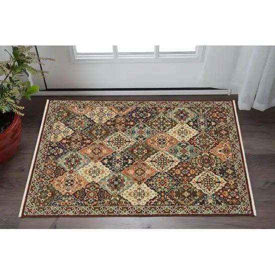 Red Rust Navy Light Blue Brown Orange Ivory And Gold Oriental Power Loom Stain Resistant Area Rug With Fringe Photo 1