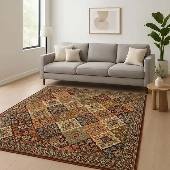 6' X 9' Red Rust Navy Light Blue Brown Orange Ivory And Gold Oriental Power Loom Stain Resistant Area Rug With Fringe Photo 1