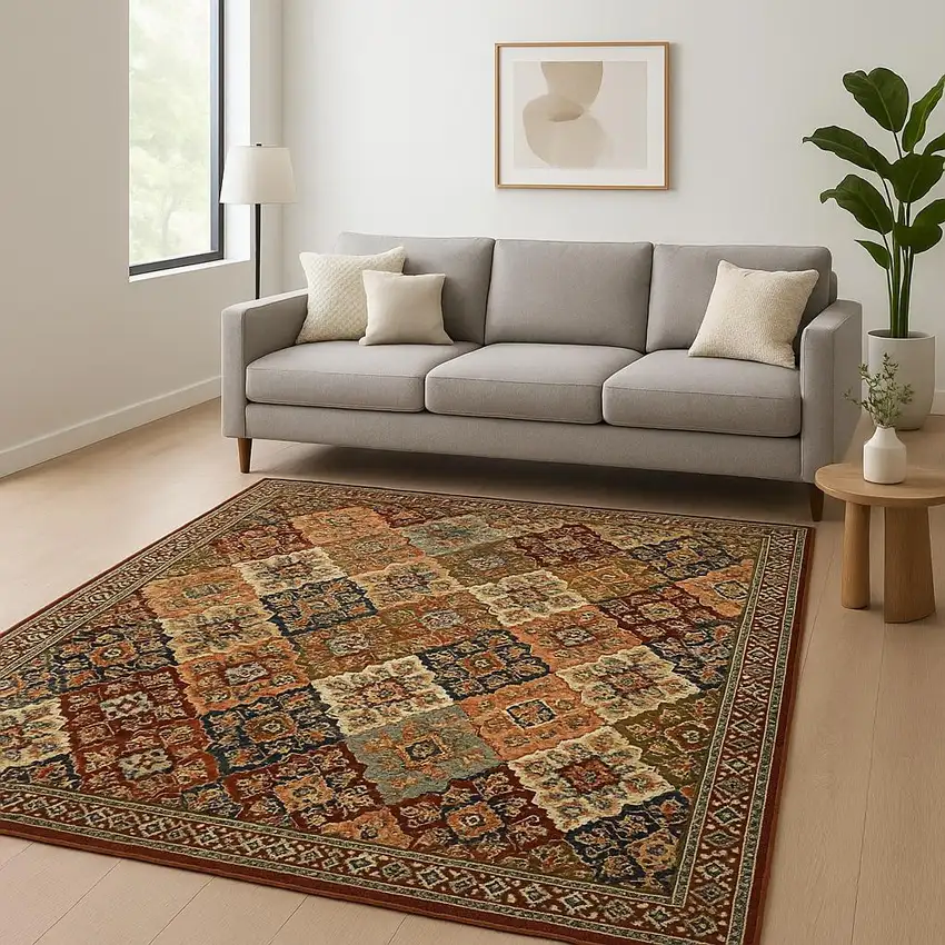 6' X 9' Red Rust Navy Light Blue Brown Orange Ivory And Gold Oriental Power Loom Stain Resistant Area Rug With Fringe Photo 1