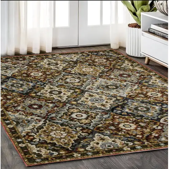 Red Tan And Ivory Medallion Area Rug Photo 1