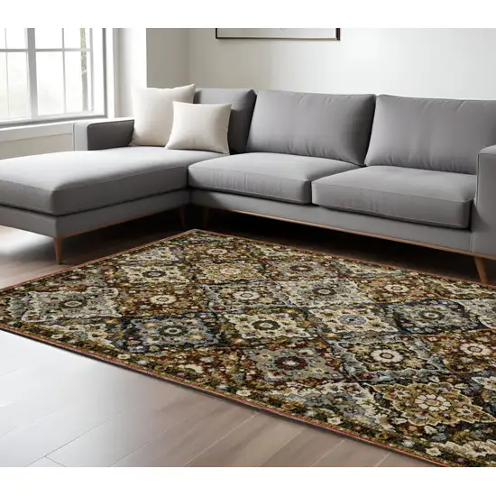 Red Tan And Ivory Medallion Area Rug Photo 1