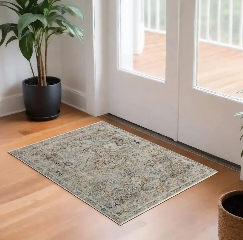 Red Tan and Blue Oriental Power Loom Worn Faded Area Rug With Fringe Photo 1