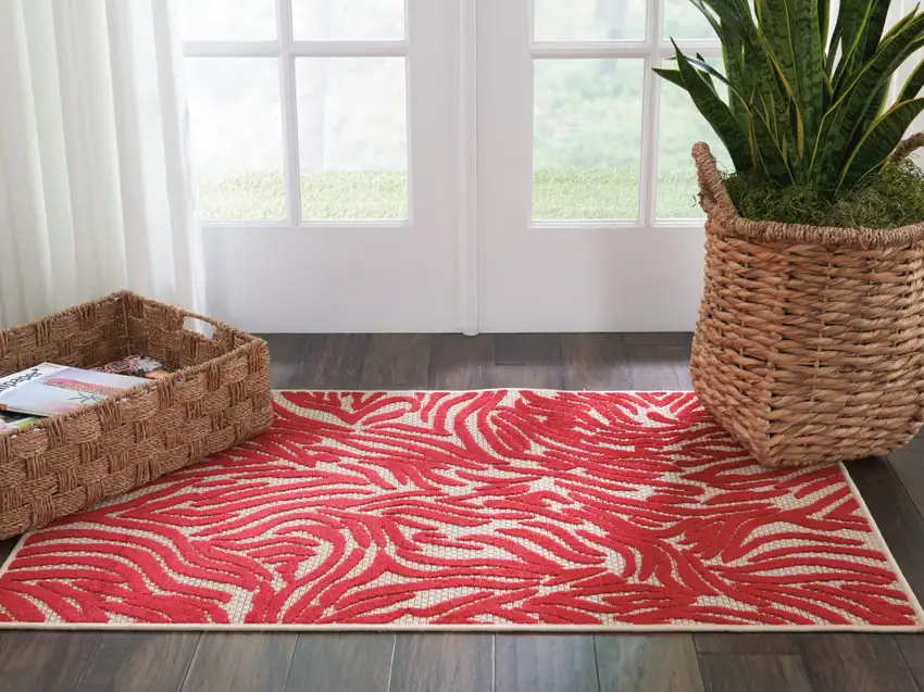 Red And Ivory Abstract Indoor Outdoor Area Rug Photo 8