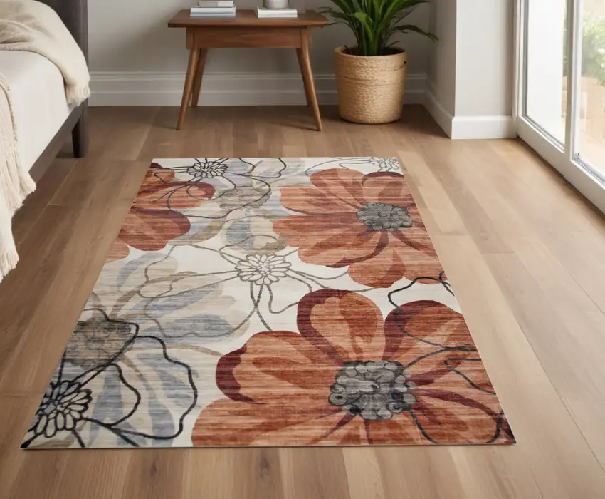 Red and Beige Floral Distressed Area Rug Photo 1