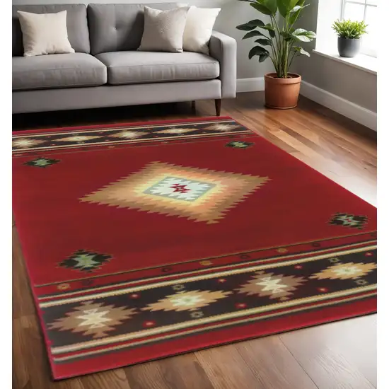 Red And Beige Ikat Pattern Area Rug Photo 1