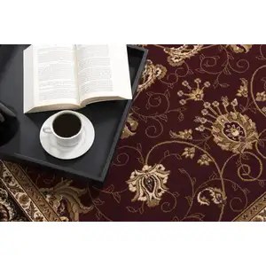Photo of Red and Black Ornamental Area Rug