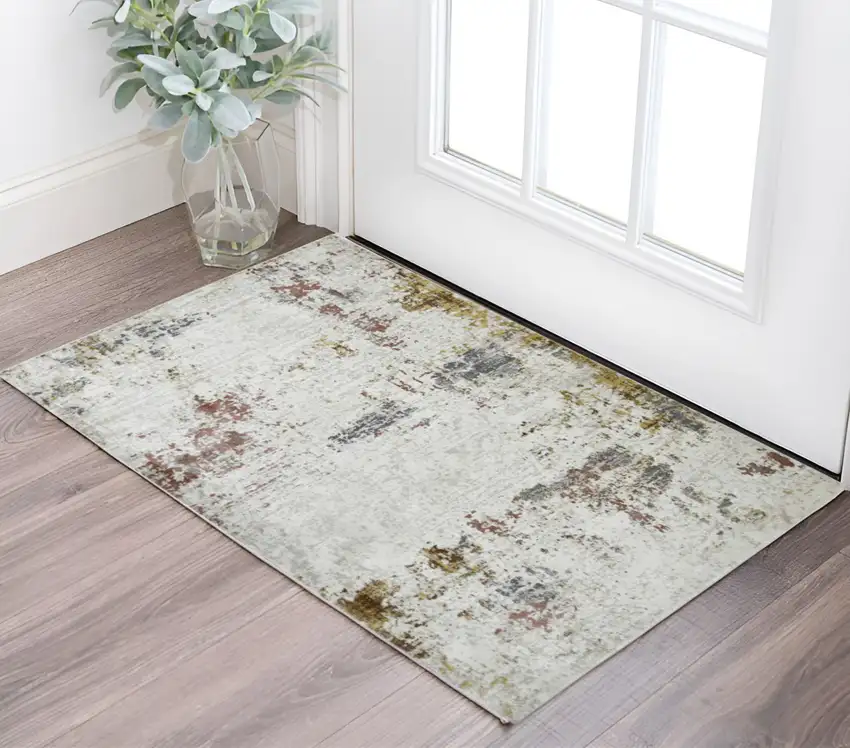 Ivory Red and Gold Abstract Power Loom Area Rug Photo 1