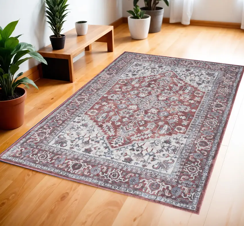 Red and Ivory Floral Medallion Power Loom Distressed Area Rug Photo 1