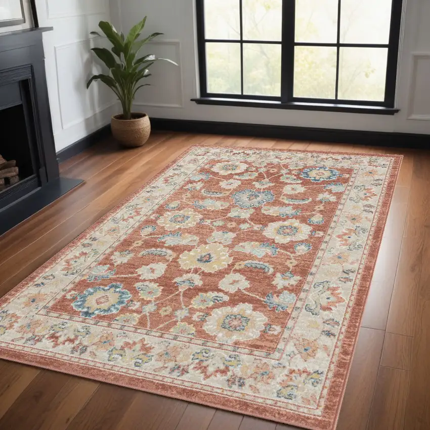 Red and Ivory Oriental Power Loom Area Rug Photo 1