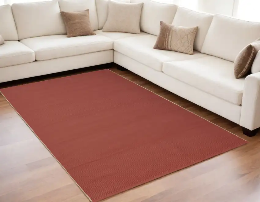 Red and Tan Hand Woven Area Rug Photo 1