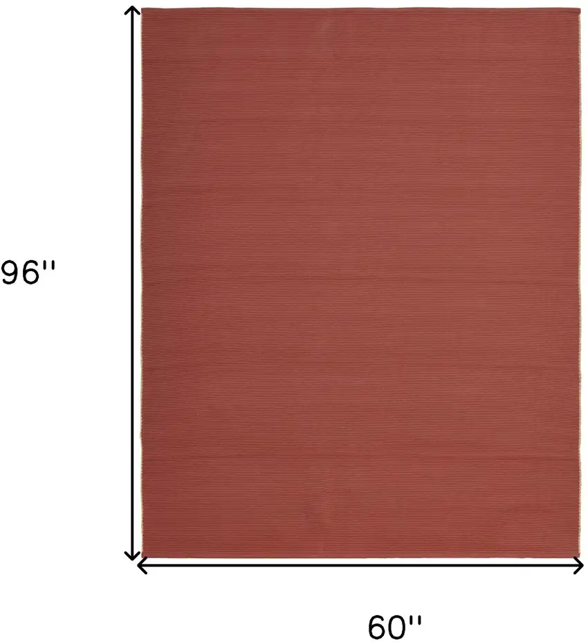 Red and Tan Hand Woven Area Rug Photo 3