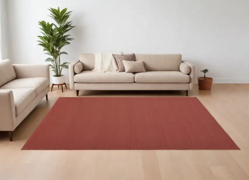 Red and Tan Hand Woven Area Rug Photo 1