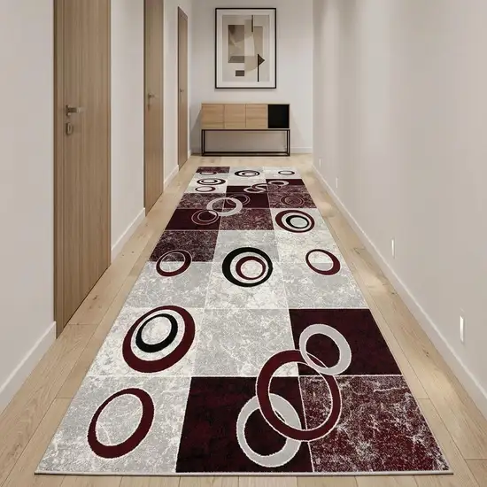 15' Red And White Abstract Runner Rug Photo 1