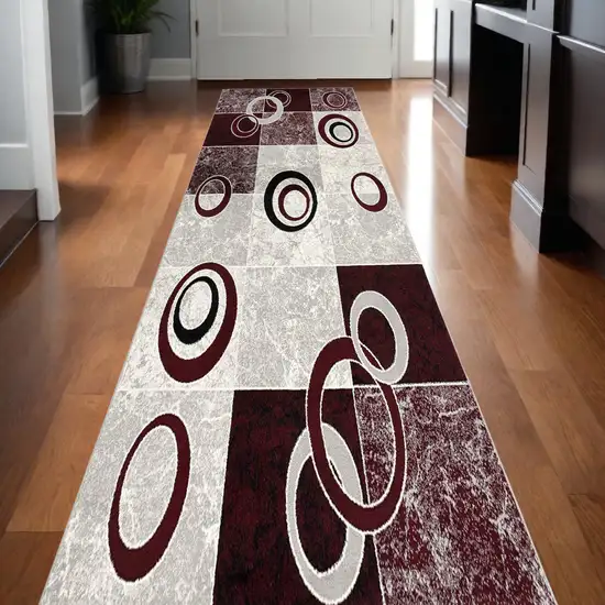 20' Red And White Abstract Runner Rug Photo 1