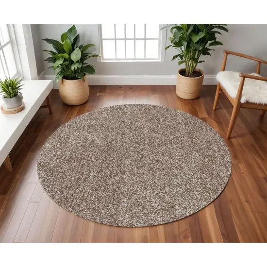6' Beige And Brown Abstract Hand Woven Round Rug Photo 1