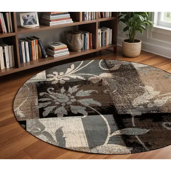 8' Beige Brown and Gray Floral Distressed Round Rug Photo 1