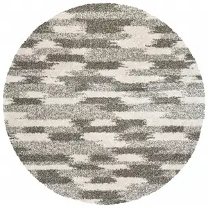 Photo of Round Gray and Ivory Geometric Pattern Area Rug