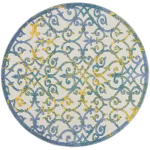 Photo of Round Ivory and Blue Indoor Outdoor Area Rug