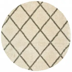 Photo of Round Ivory and Gray Geometric Lattice Area Rug