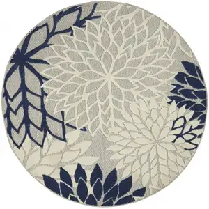 Photo of Round Ivory and Navy Indoor Outdoor Area Rug
