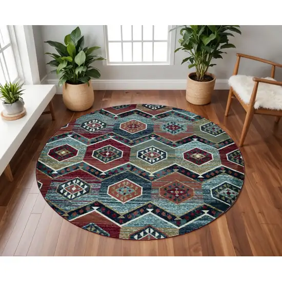7' Red And Blue Geometric Round Rug Photo 1
