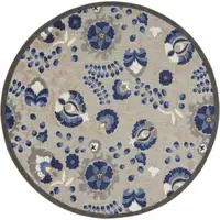 Photo of Round Natural and Blue Indoor Outdoor Area Rug