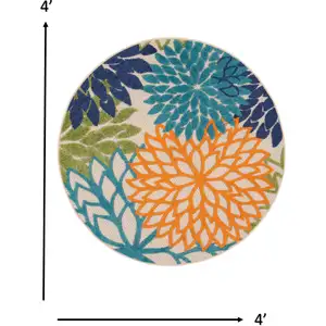 Photo of Round Orange Floral Outdoor Area Rug