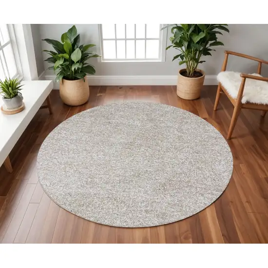 8' Ivory Hand Woven Round Rug Photo 1