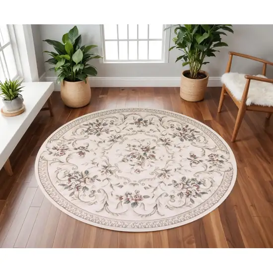 8' Ivory Red And Green Floral Medallion Round Rug Photo 1