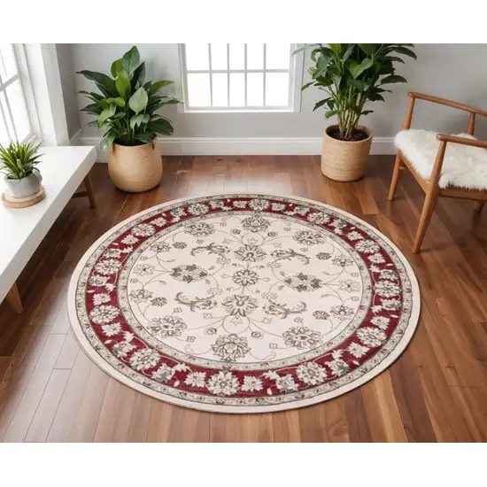 8' Ivory And Red Floral Medallion Round Rug Photo 1