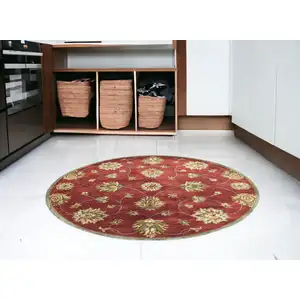 Photo of Round Red Floral Vine Wool Indoor Area Rug