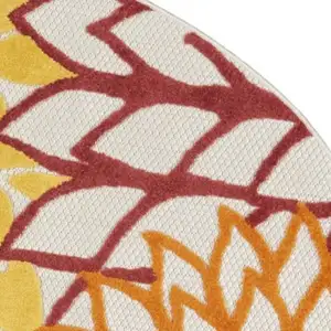 Photo of Round Red Tropical Indoor Outdoor Area Rug