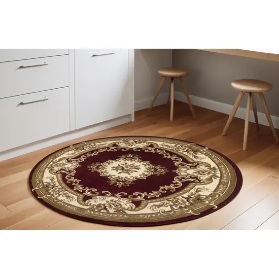 7' Red and Ivory Floral Border Round Rug Photo 1